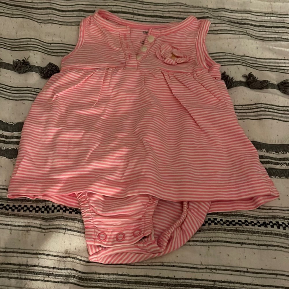 pink and white dress with a clip at the bottom